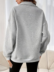 Casual women's sweater with half closure zipper