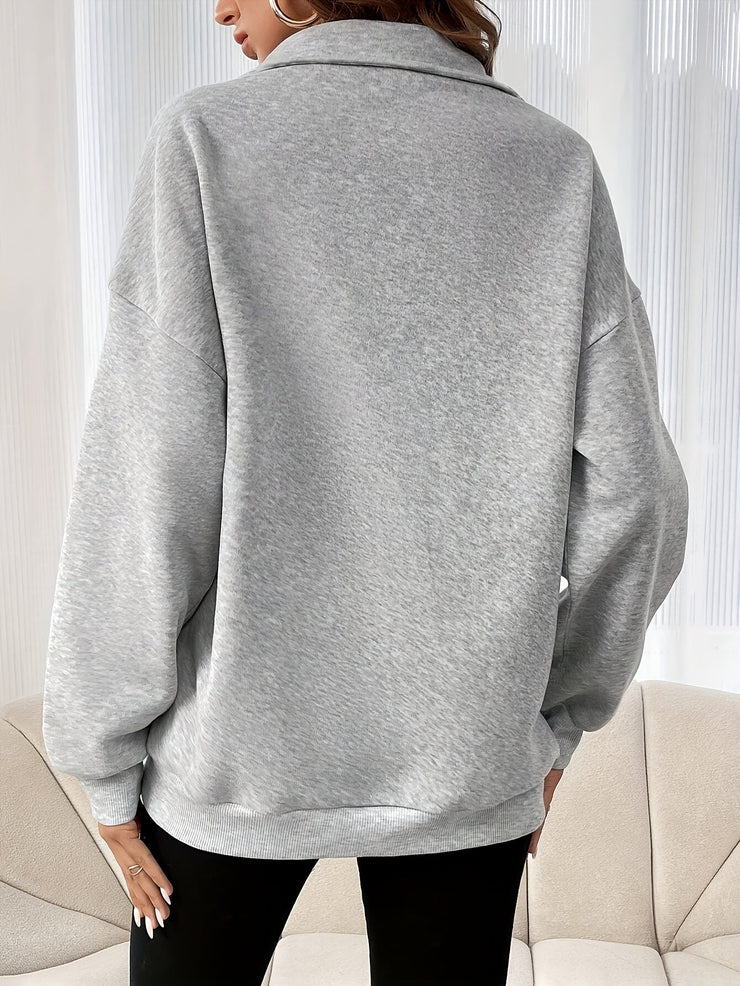 Casual women's sweater with half closure zipper