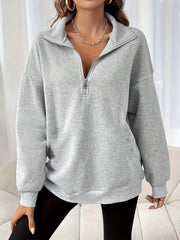 Casual women's sweater with half closure zipper