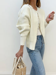 Women's trimmed ripped hem cardigan