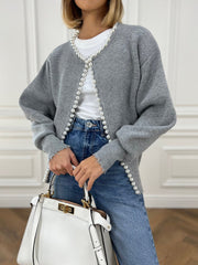 Women's trimmed ripped hem cardigan