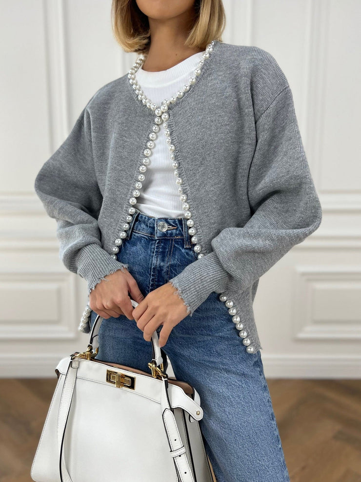 Women's trimmed ripped hem cardigan