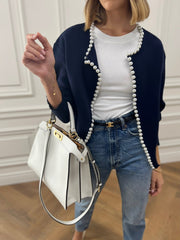 Women's trimmed ripped hem cardigan