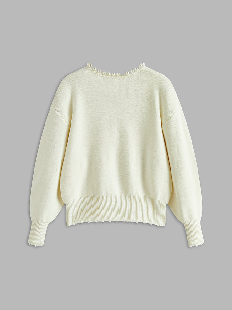 Women's trimmed ripped hem cardigan