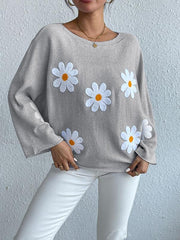 Women's loose knitted top with floral design